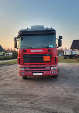 Scania 144L-380 flatbed truck